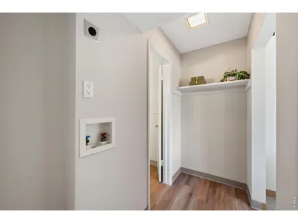 a bathroom with a sink vanity and a mirror