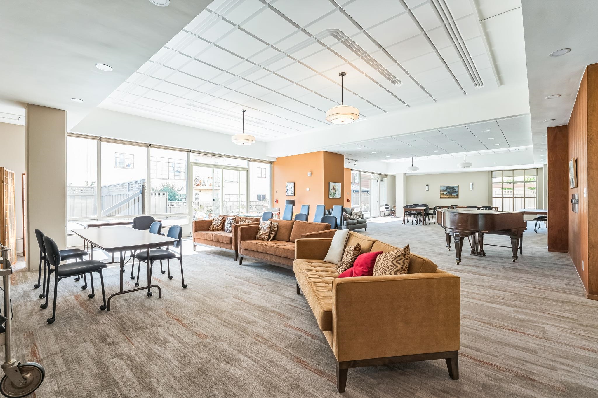 2550 Dana Street, Unit 2F Berkeley, CA 94704 - Photo 22 of 32 a living room with furniture and a large window