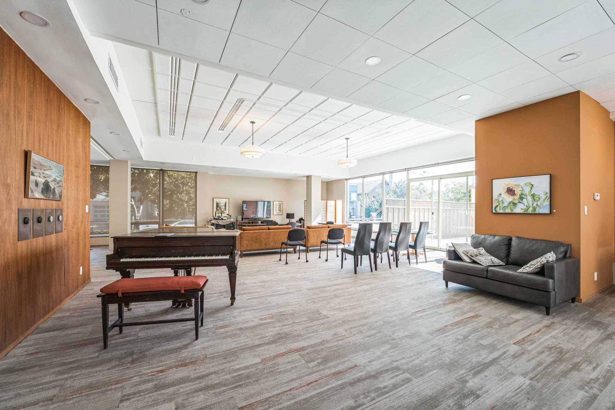 2550 Dana Street, Unit 2F Berkeley, CA 94704 - Photo 25 of 32 a living room with furniture and a wooden floor