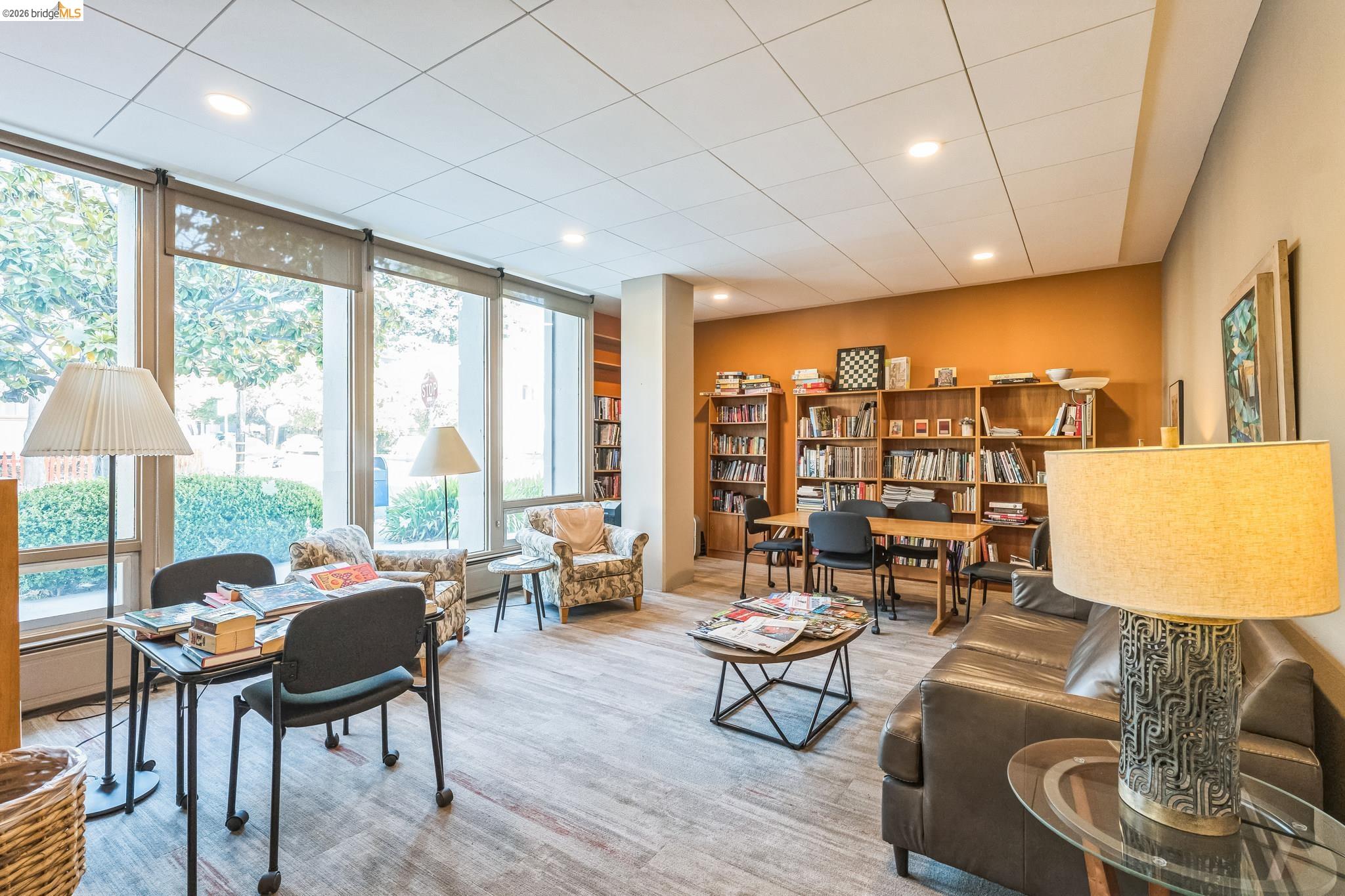 2550 Dana Street, Unit 2F Berkeley, CA 94704 - Photo 26 of 32 a living room with furniture and a large window