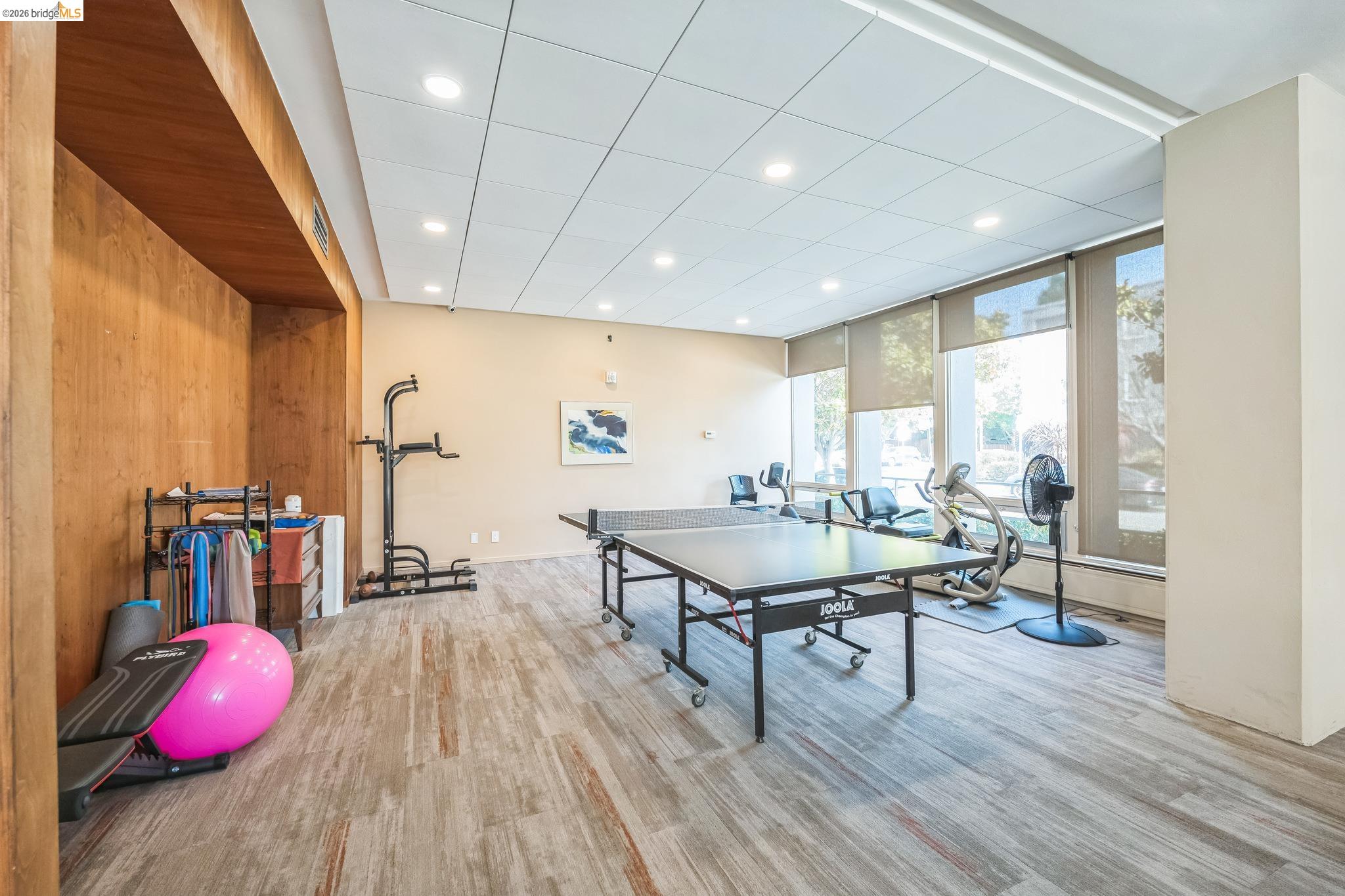 2550 Dana Street, Unit 2F Berkeley, CA 94704 - Photo 31 of 32 a room with furniture and wooden floor