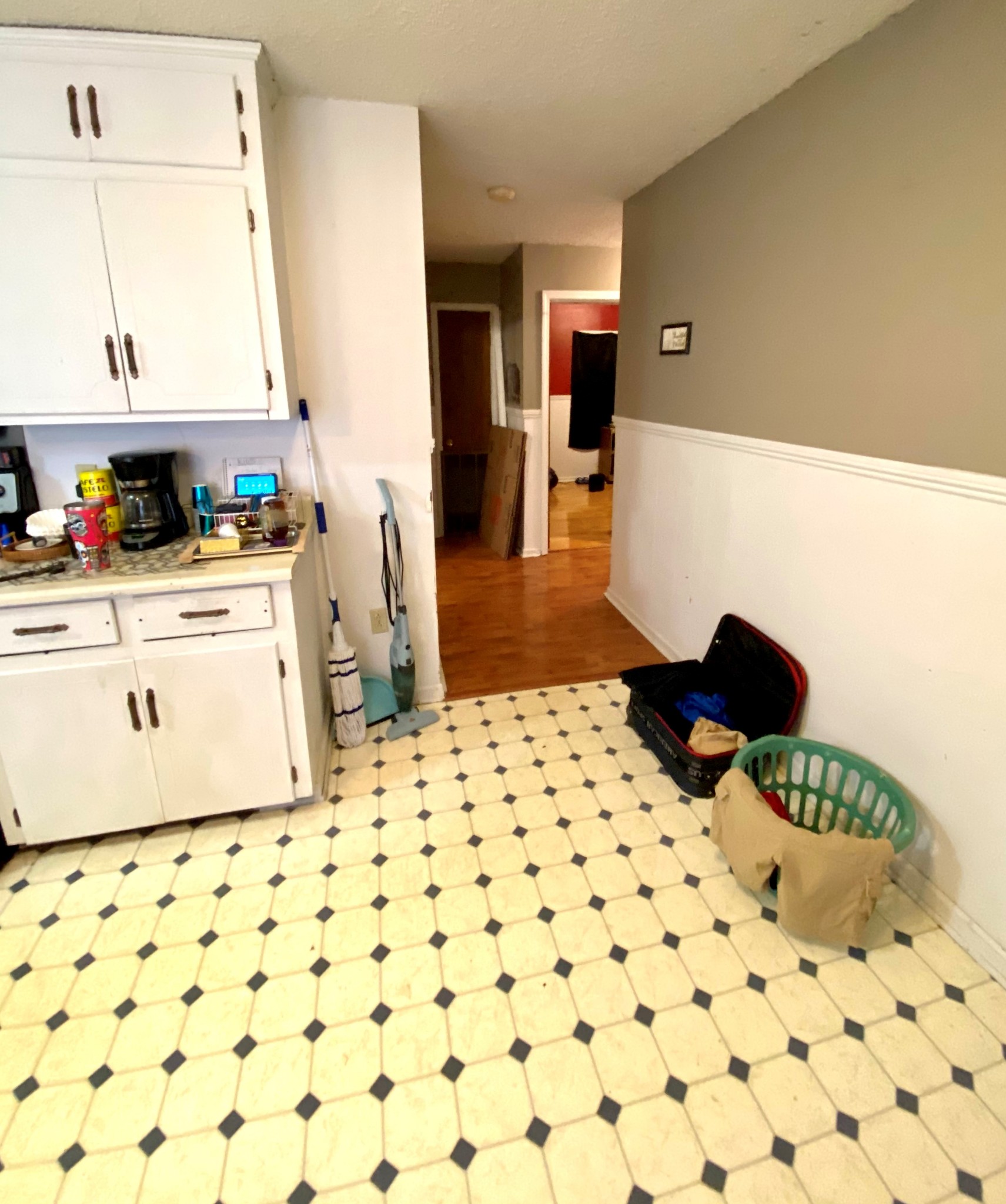 1071 Baugh Road Ardmore, TN 38449 - Photo 12 of 16 a kitchen with a sink a stove and refrigerator