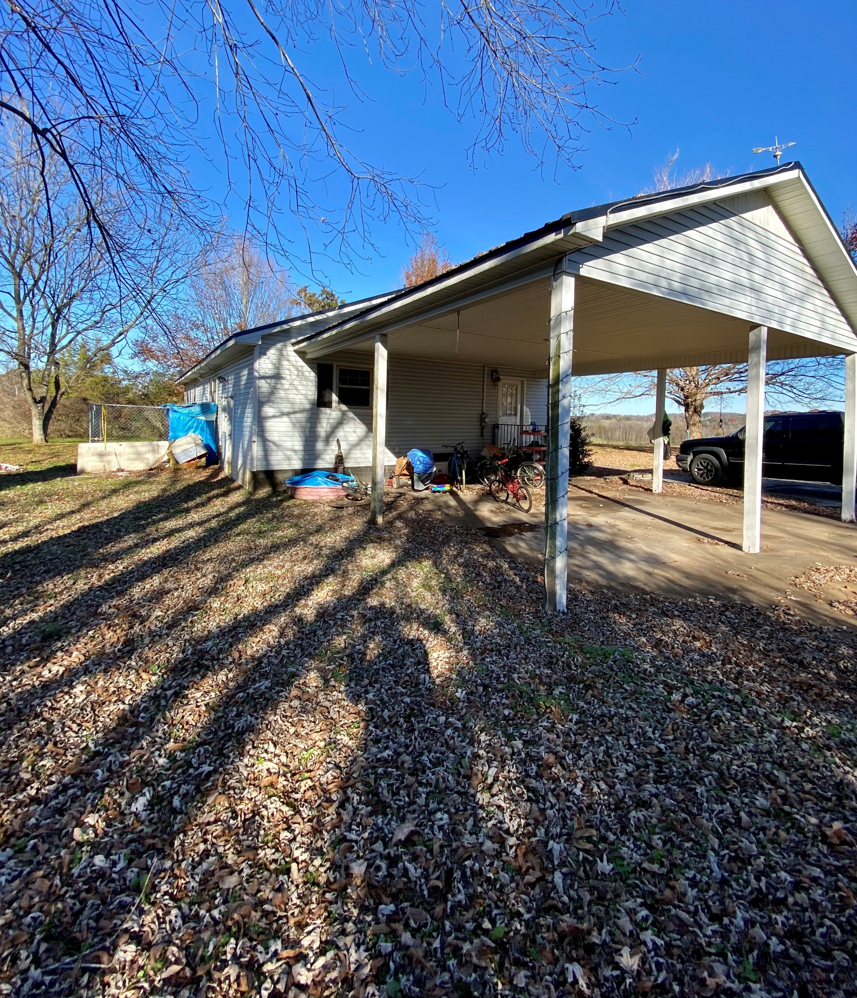 1071 Baugh Road Ardmore, TN 38449 - Photo 4 of 16 a view of a house with backyard and sitting area