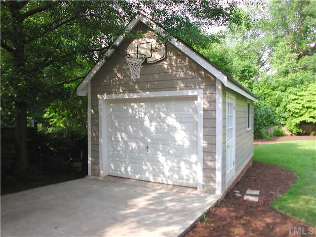 2234 The Circle Raleigh, NC 27608 - Photo 12 of 12 a view of backyard of house with green space
