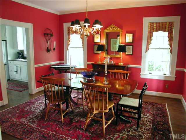 2234 The Circle Raleigh, NC 27608 - Photo 3 of 12 a view of a dining room with furniture and chandelier