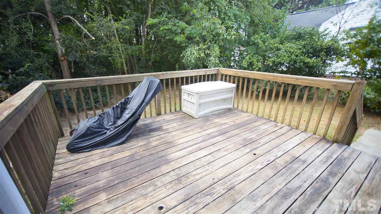 2829 Pinehurst Drive Raleigh, NC 27604 - Photo 14 of 16 a view of balcony with wooden floor and fence