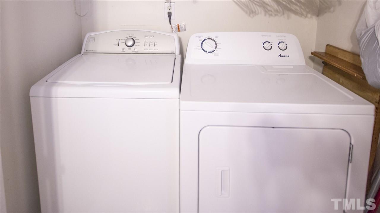 2829 Pinehurst Drive Raleigh, NC 27604 - Photo 8 of 16 a utility room with dryer and washer