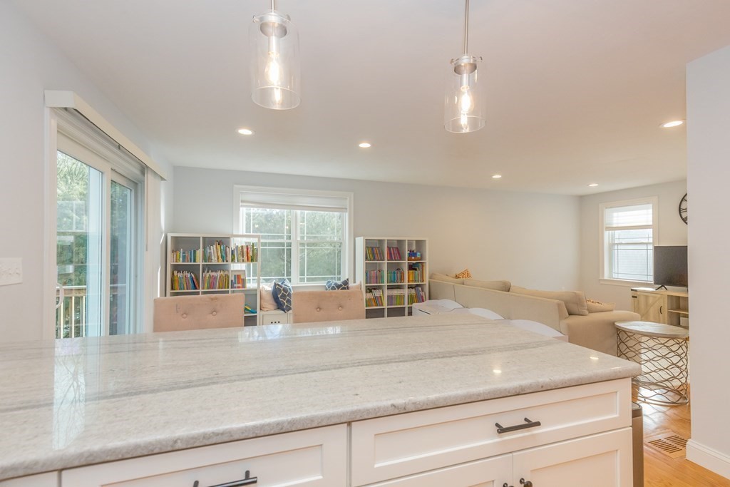 40 Allen Road Billerica, MA 01821 - Photo 5 of 32 a kitchen with counter top space and living room view