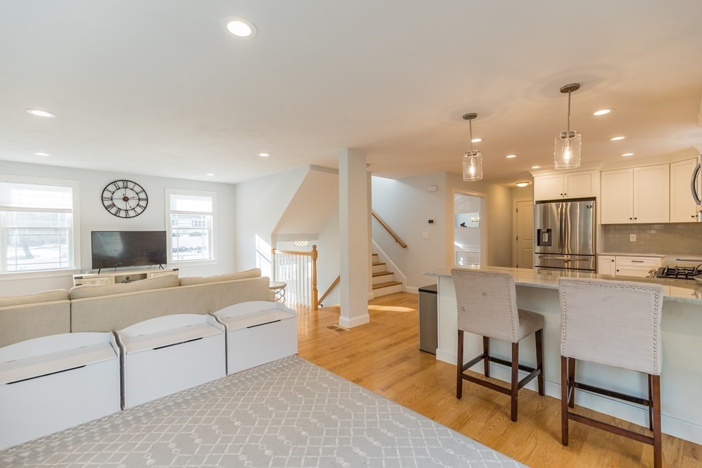 40 Allen Road Billerica, MA 01821 - Photo 6 of 32 a living room with furniture and kitchen view