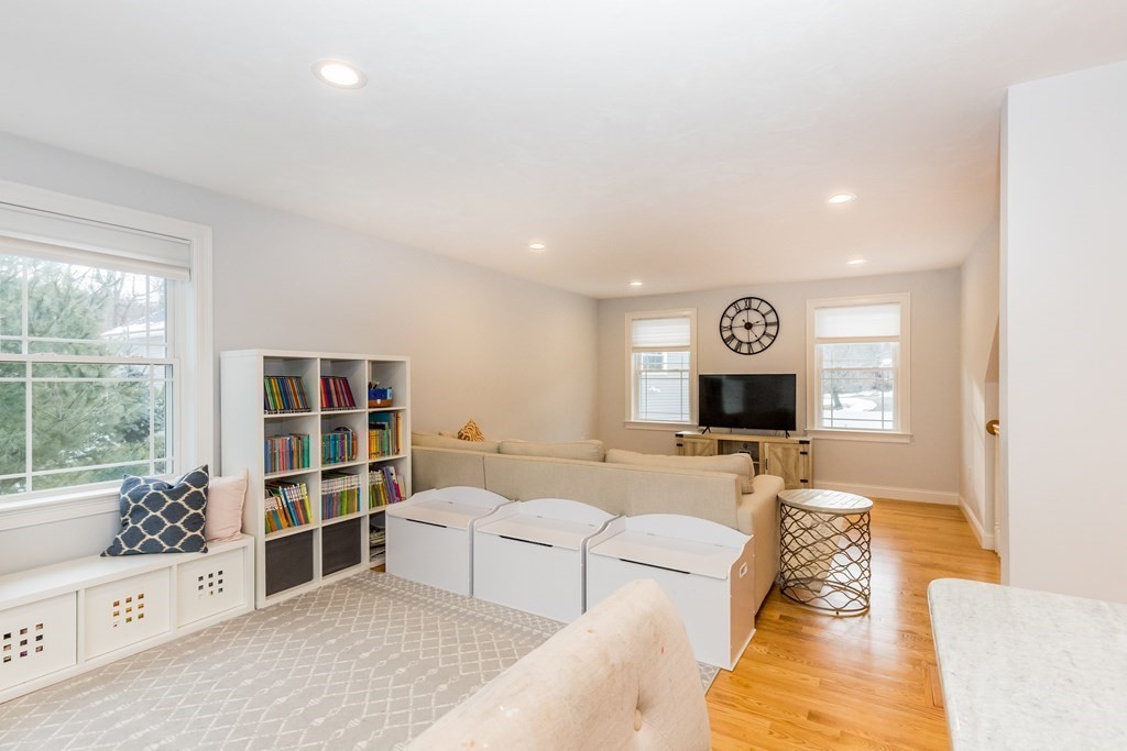 40 Allen Road Billerica, MA 01821 - Photo 7 of 32 a living room with furniture and a gate
