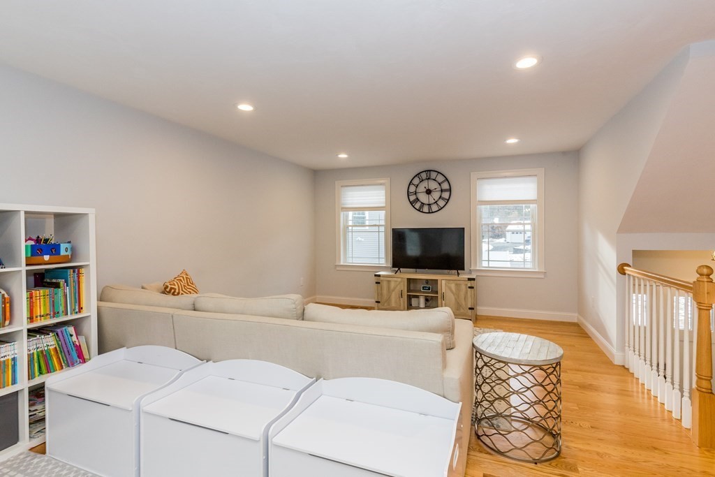 40 Allen Road Billerica, MA 01821 - Photo 8 of 32 a living room with furniture and a flat screen tv