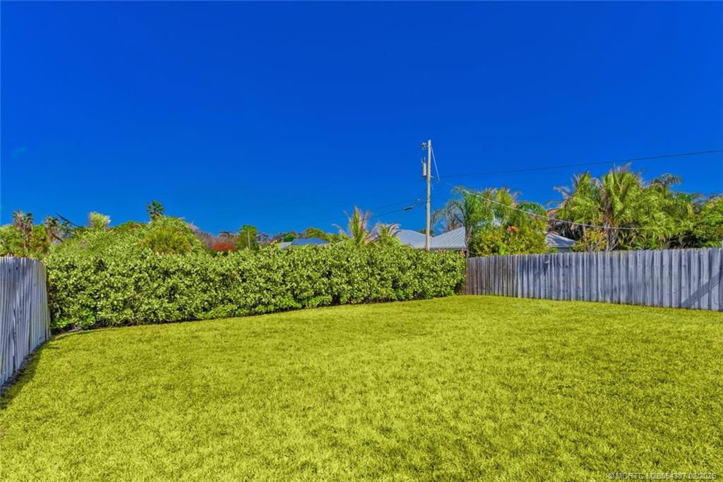 1091 Southwest 30th Street Palm City, FL 34990 - Photo 28 of 45 Lawn digitally enhanced following our rare freeze