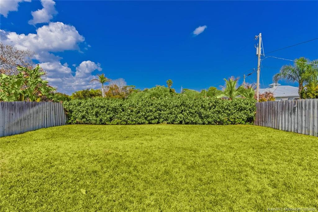 1091 Southwest 30th Street Palm City, FL 34990 - Photo 29 of 45 Lawn digitally enhanced following our rare freeze