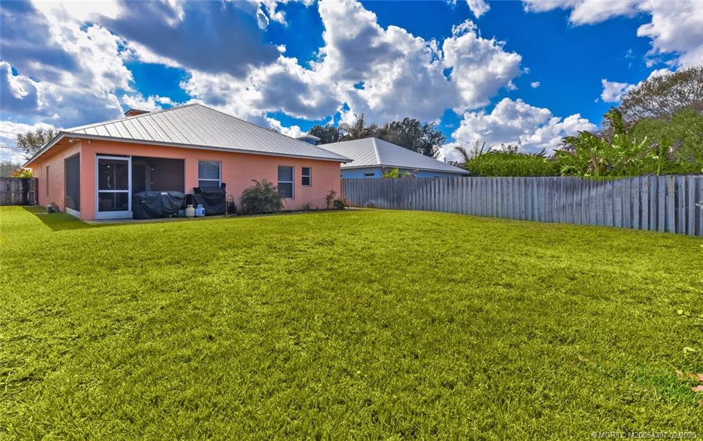 1091 Southwest 30th Street Palm City, FL 34990 - Photo 30 of 45 Lawn digitally enhanced following our rare freeze