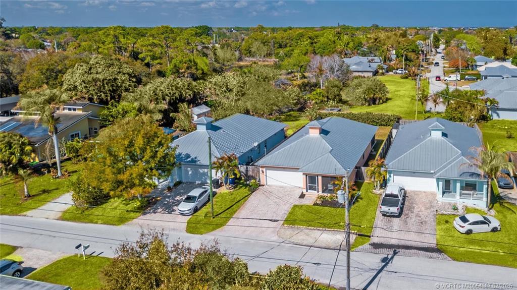 1091 Southwest 30th Street Palm City, FL 34990 - Photo 31 of 45 Lawn digitally enhanced following our rare freeze