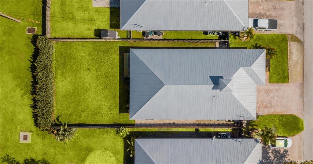 1091 Southwest 30th Street Palm City, FL 34990 - Photo 37 of 45 Lawn digitally enhanced following our rare freeze