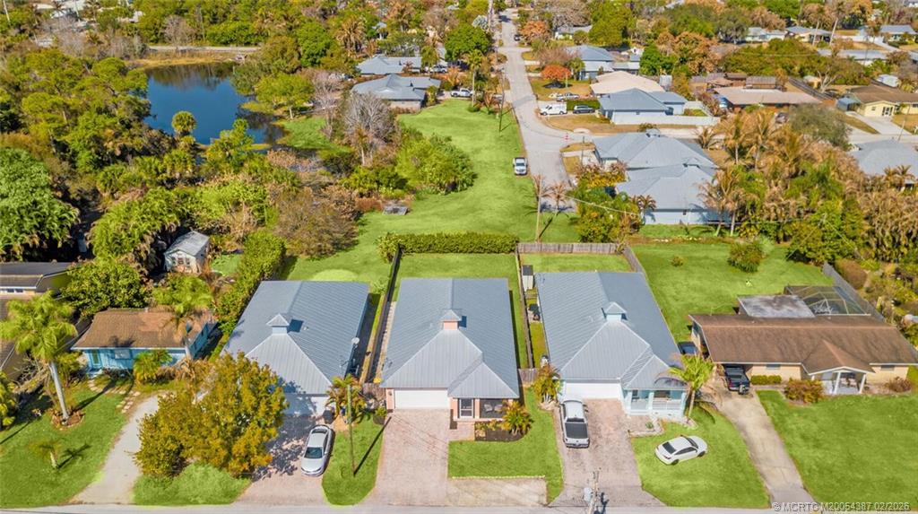 1091 Southwest 30th Street Palm City, FL 34990 - Photo 40 of 45 Lawn digitally enhanced following our rare freeze