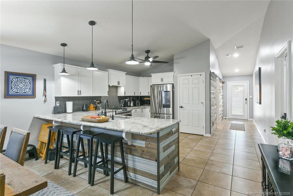 1091 Southwest 30th Street Palm City, FL 34990 - Photo 7 of 45