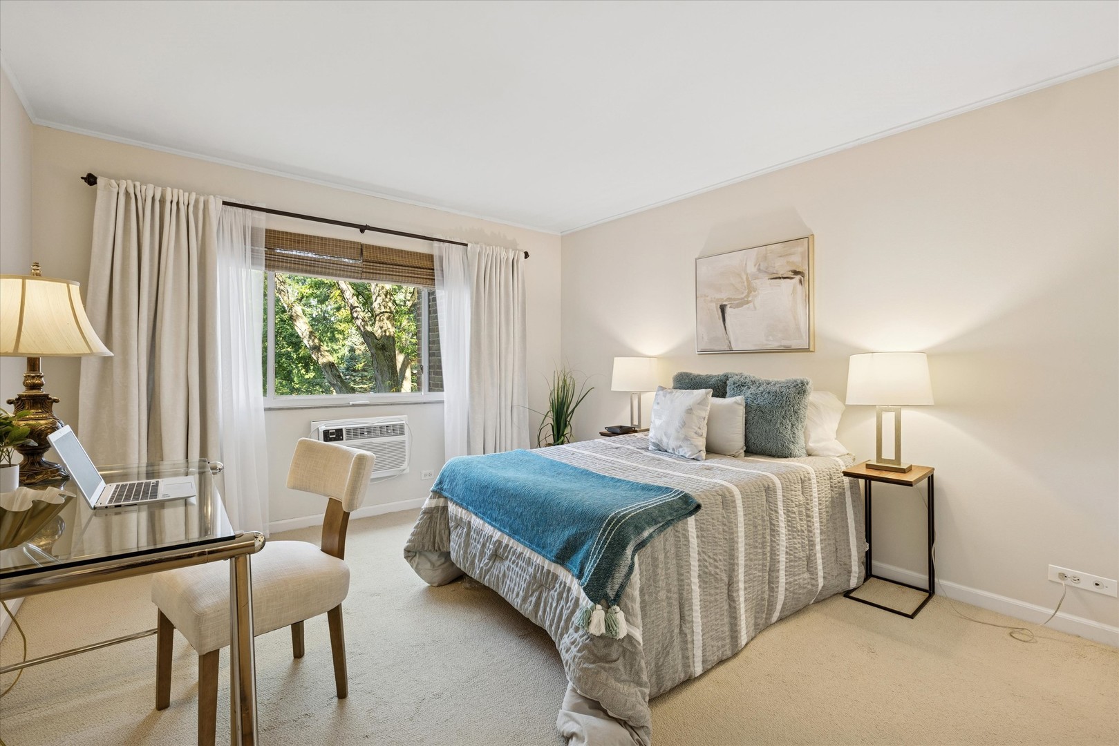 320 Claymoor, Unit 2D Hinsdale, IL 60521 - Photo 11 of 16 a bedroom with a bed a table and chair