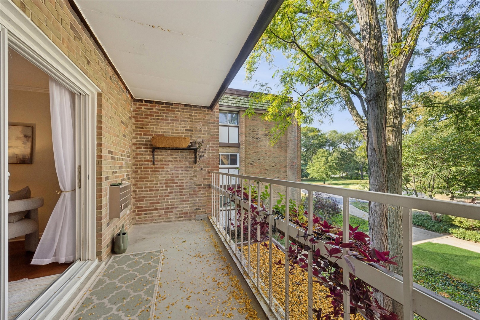 320 Claymoor, Unit 2D Hinsdale, IL 60521 - Photo 13 of 16 a view of balcony with wooden floor
