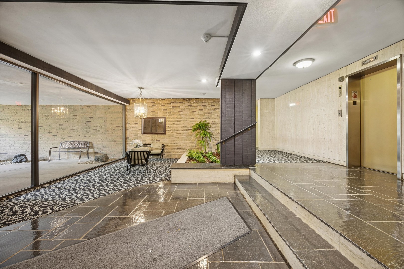 320 Claymoor, Unit 2D Hinsdale, IL 60521 - Photo 2 of 16 a lobby with furniture and floor to ceiling window