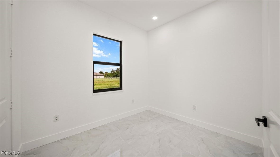 328 Ranch Avenue Lehigh Acres, FL 33974 - Photo 33 of 35 a view of an empty room