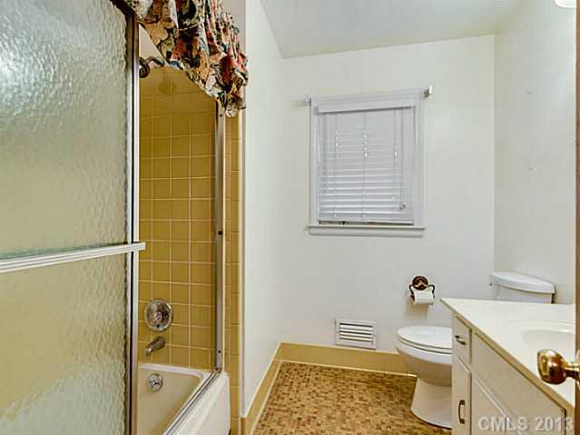 3860 Litchfield Road Charlotte, NC 28211 - Photo 9 of 11 a bathroom with a sink toilet and shower