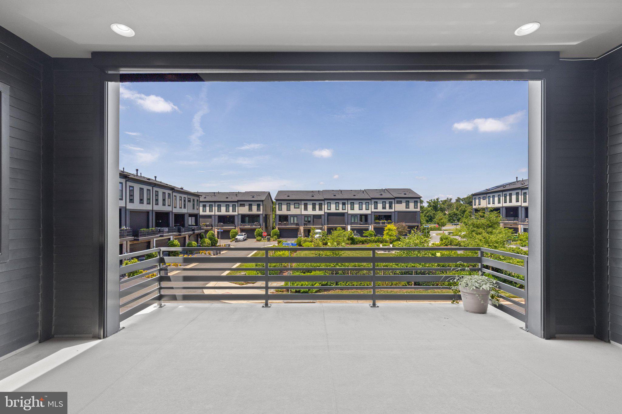 20375 Codman Drive Ashburn, VA 20147 - Photo 23 of 63 Motorized Retractable screen creates another room