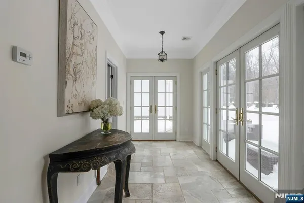 a view of entryway with a front door