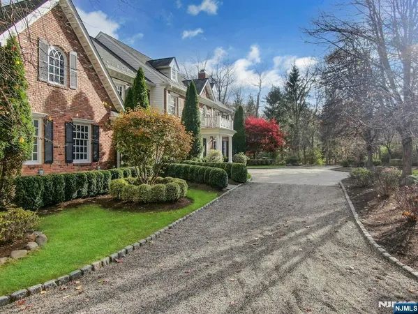 a view of a building with a yard