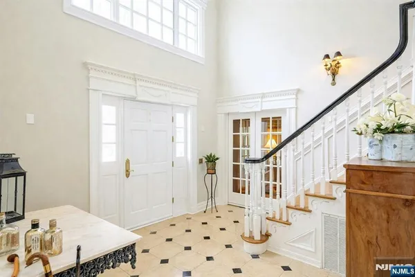 a bedroom with a bed and a table in it