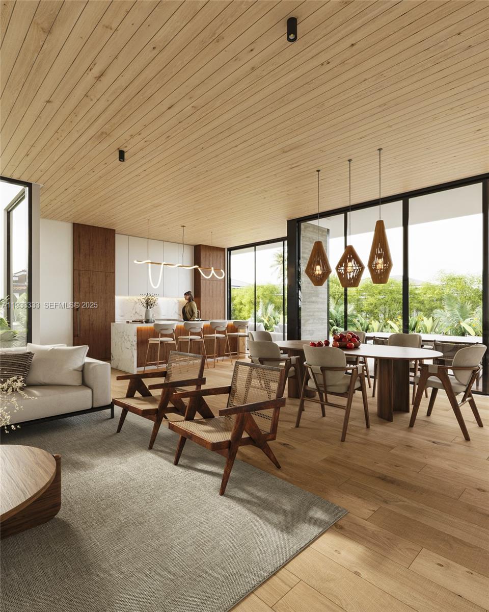 4340 Southwest 10th Street Miami, FL 33134 - Photo 4 of 4 a living room with lots of furniture and a large window