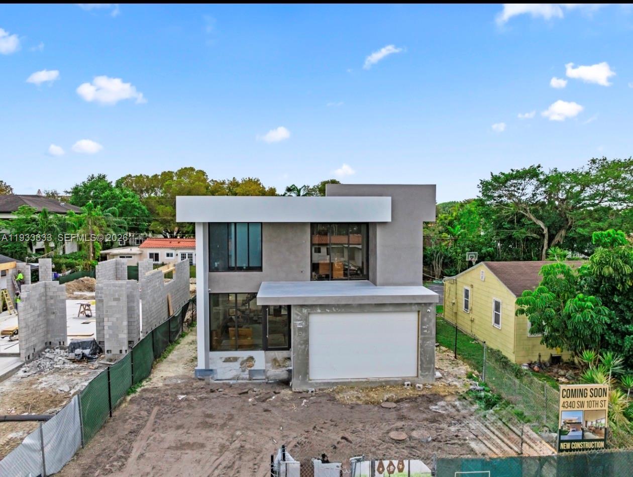 4340 Southwest 10th Street Miami, FL 33134 - Photo 5 of 5 a view of an house with outdoor space and sitting area