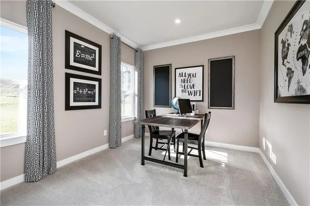 a workspace with furniture and window