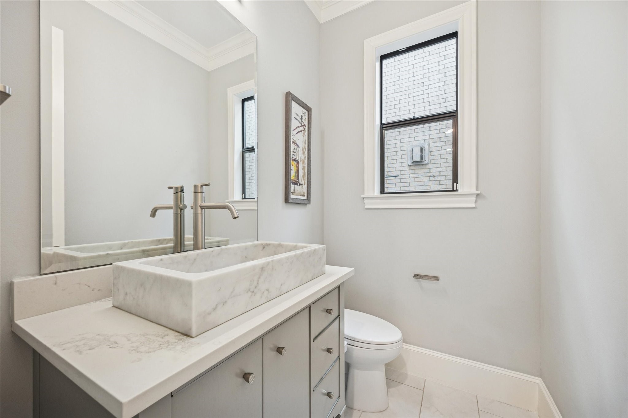 4108 Sunset Boulevard Houston, TX 77005 - Photo 12 of 21 a bathroom with a sink toilet and vanity