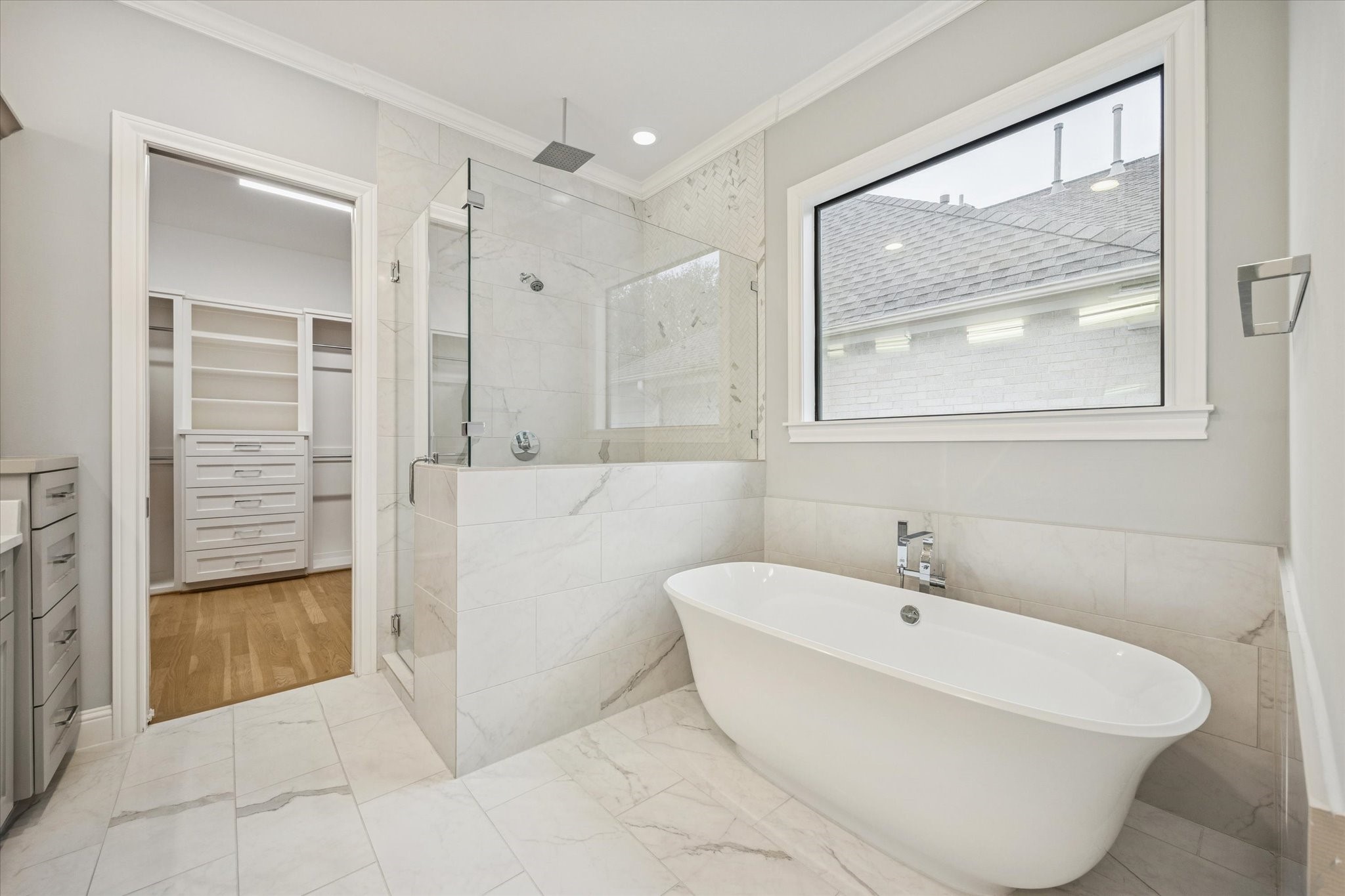 4108 Sunset Boulevard Houston, TX 77005 - Photo 18 of 21 a bathroom with a bathtub and a shower