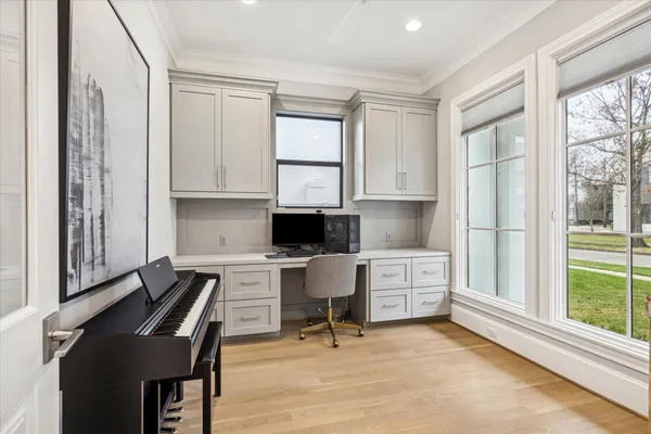 a kitchen with a cabinets and window