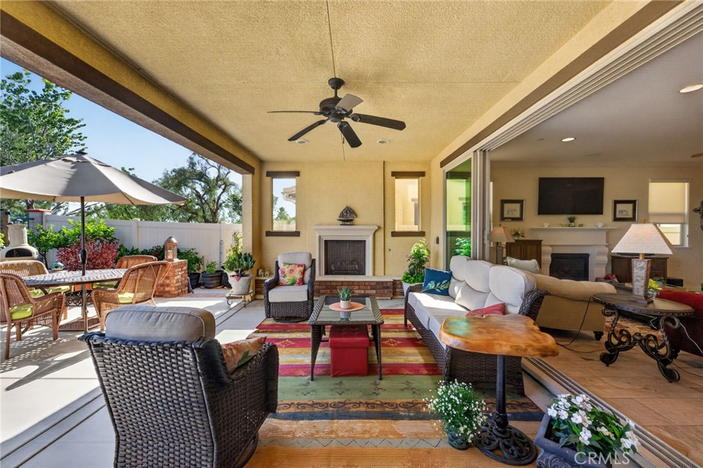 31749 Country View Road Temecula, CA 92591 - Photo 12 of 68 a living room with furniture fireplace and a large window