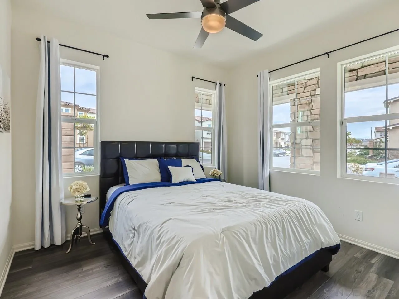 1263 Spivey Road Chula Vista, CA 91913 - Photo 12 of 26 a bedroom with a bed and window