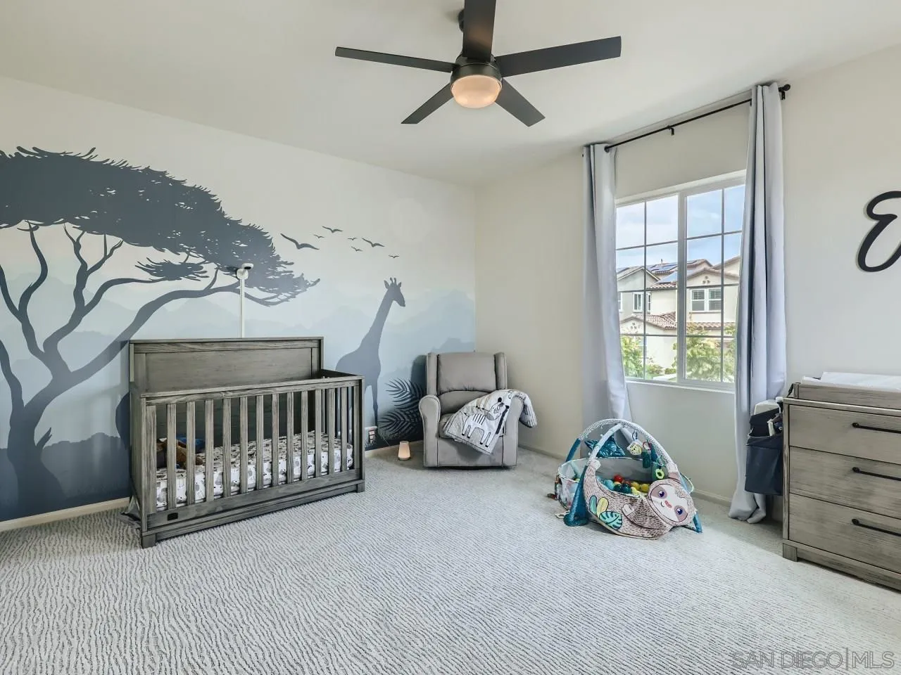 1263 Spivey Road Chula Vista, CA 91913 - Photo 18 of 26 a bedroom with a bed and a window