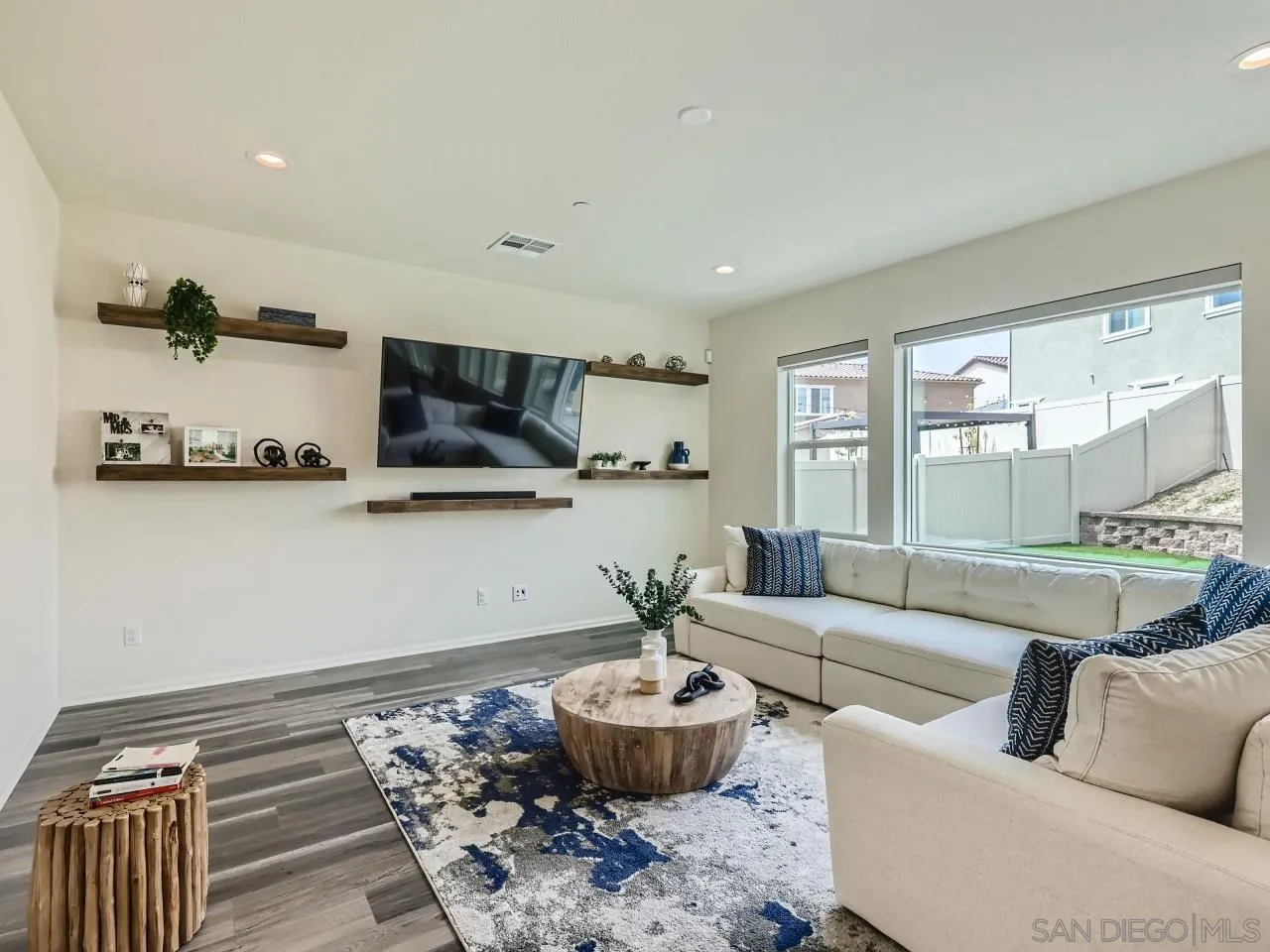 1263 Spivey Road Chula Vista, CA 91913 - Photo 6 of 26 a living room with furniture and a large window