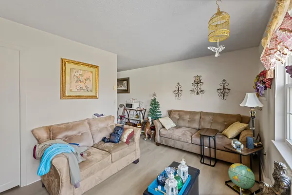 a living room with furniture and couch
