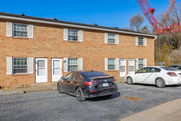 a car parked in front of a house