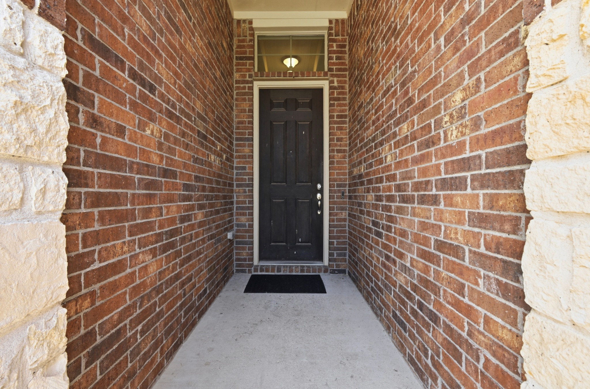 877 Hot Spring Valley Buda, TX 78610 - Photo 3 of 36 a view of a brick wall