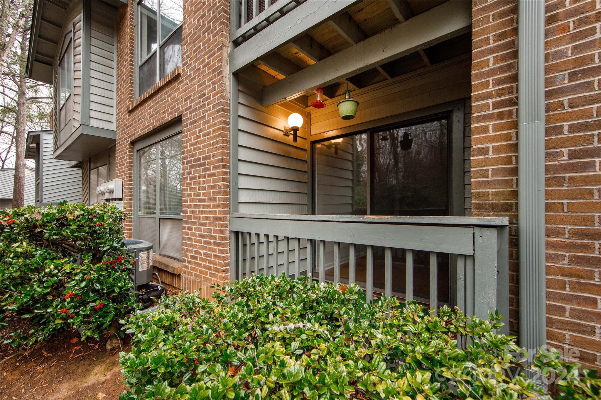 5020 Sardis Road, Unit E Charlotte, NC 28270 - Photo 23 of 27 a view of a house with a flower garden
