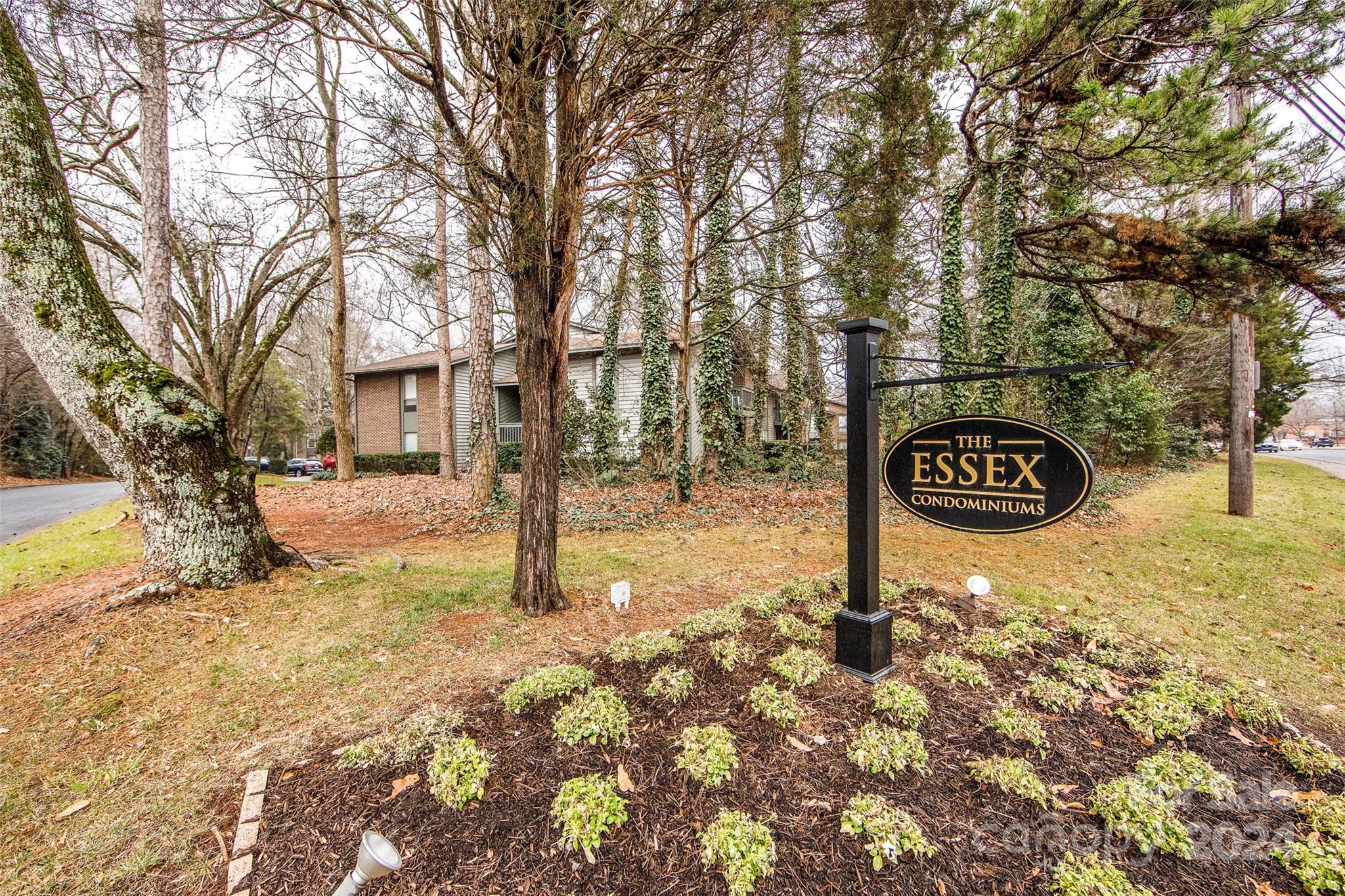 5020 Sardis Road, Unit E Charlotte, NC 28270 - Photo 24 of 27 a view of a trees front of a house