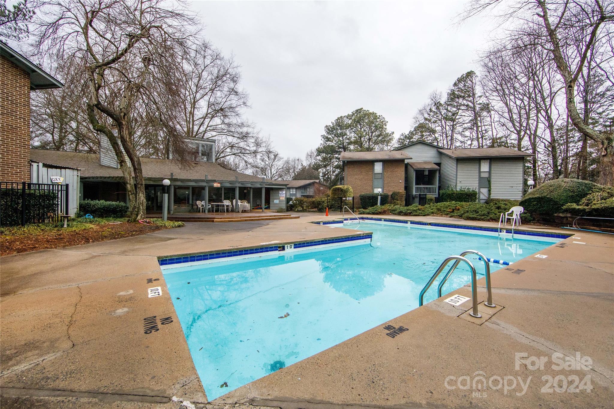 5020 Sardis Road, Unit E Charlotte, NC 28270 - Photo 25 of 27 a swimming pool view with outdoor seating