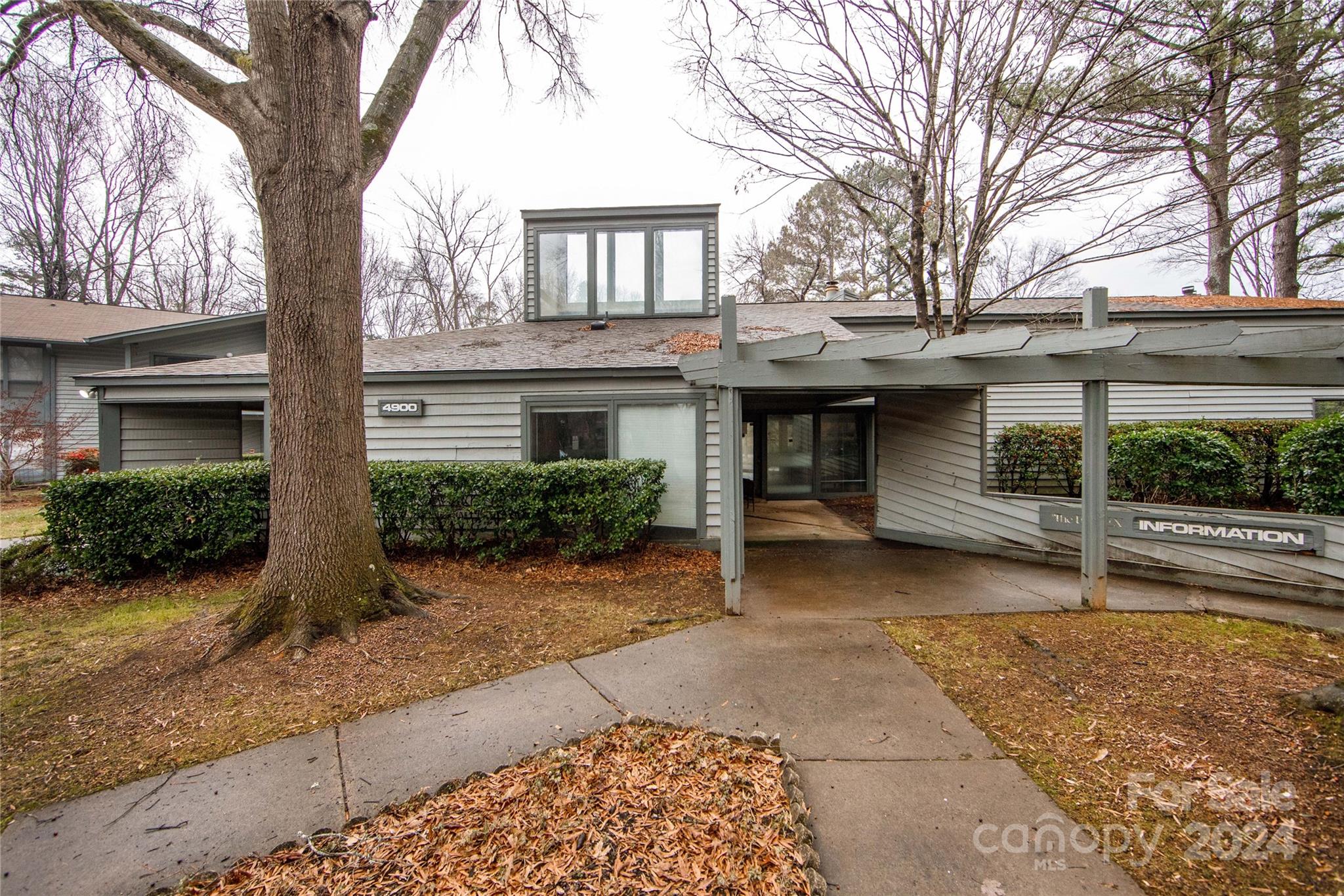 5020 Sardis Road, Unit E Charlotte, NC 28270 - Photo 27 of 27 a view of a house with a yard