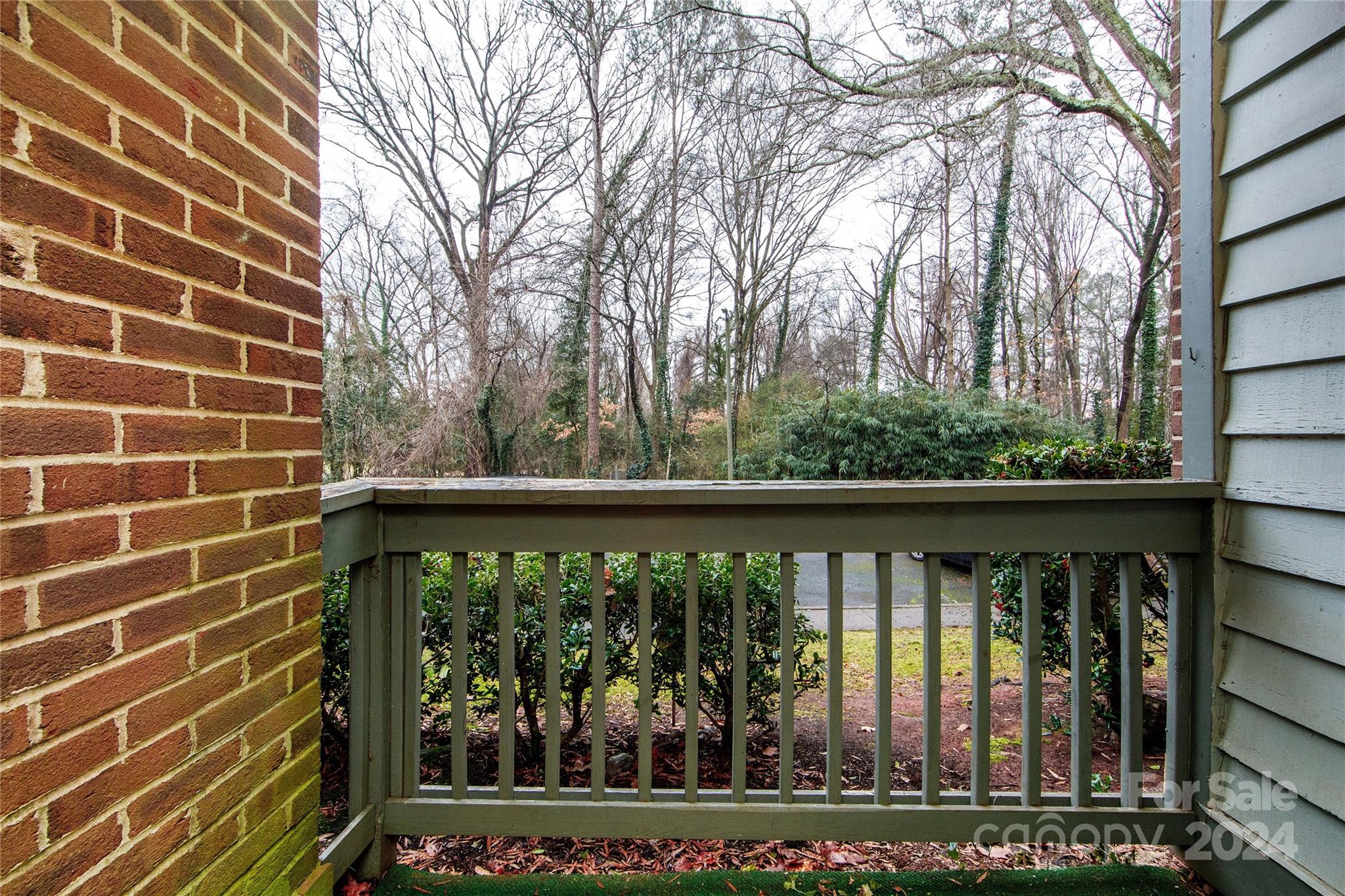 5020 Sardis Road, Unit E Charlotte, NC 28270 - Photo 7 of 27 a view of a balcony with a swing