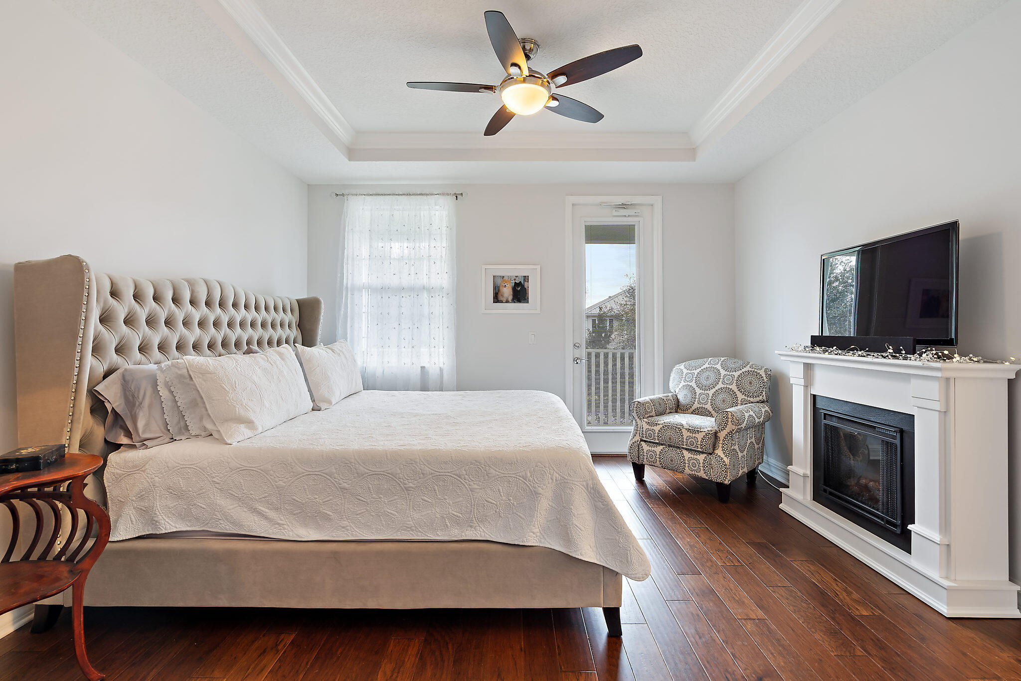 1237 Dakota Drive Jupiter, FL 33458 - Photo 18 of 32 a bedroom with a bed and a flat screen tv